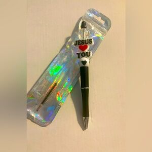 Hand beaded pen.